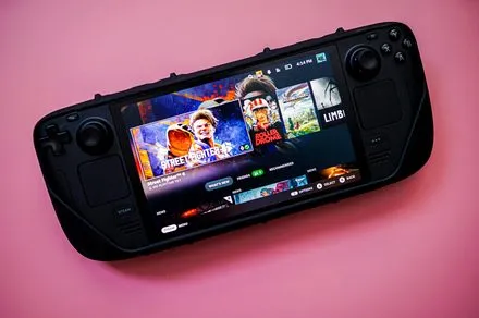 The Valve Steam Deck OLED handheld console is shown with updated global pricing of $790 and $950.