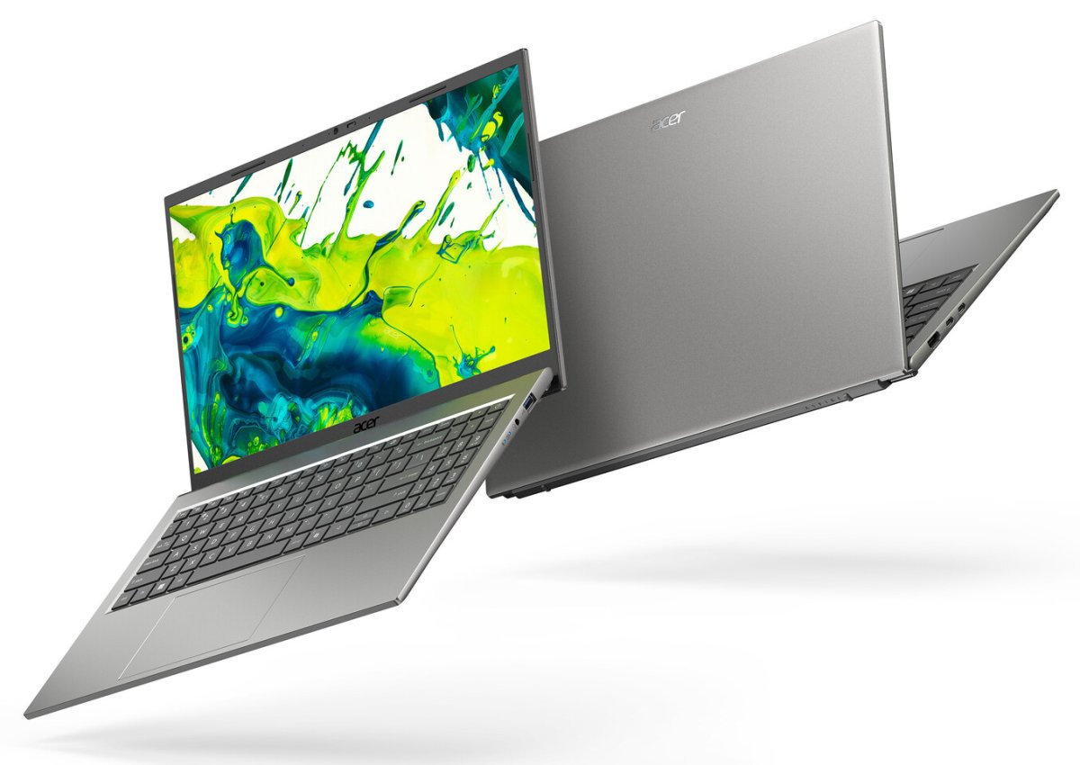 The display features the Acer Swift Spin 14 AI and Aspire Go 15 laptops powered by Qualcomm Snapdragon X2 processors.