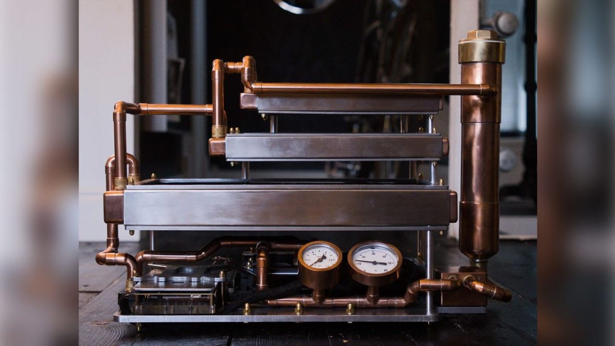 Custom-built passive water-cooled PC relies on convection chimney effect powered by triple-stacked radiators — 9800X3D build with RTX 5080 has no fans, copper, and radiator chimney, but struggles to keep temperatures down