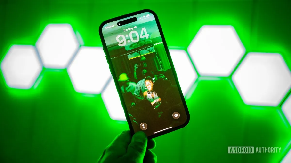 A smartphone displays a curated high-resolution photographic background for mobile devices.