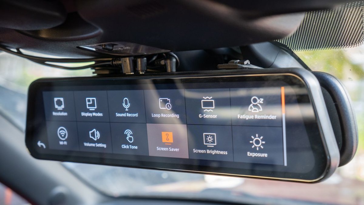 Enterprise smart dash cam mounted on a vehicle windshield with visible sensor array and wiring