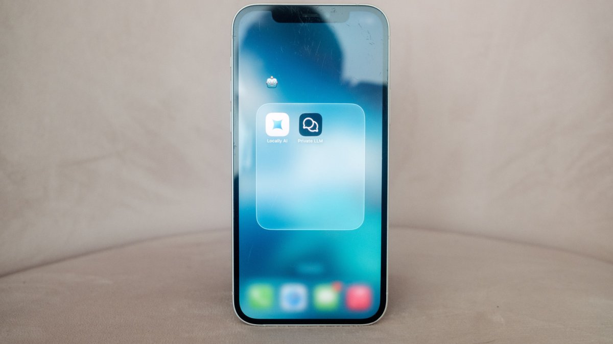 An iPhone displays a local AI chatbot application running offline to protect user privacy.