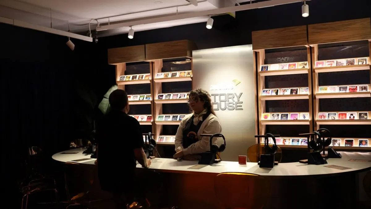 Visitors experience immersive spatial audio at a Manhattan pop-up event showcasing Dolby Atmos audiobook technology.
