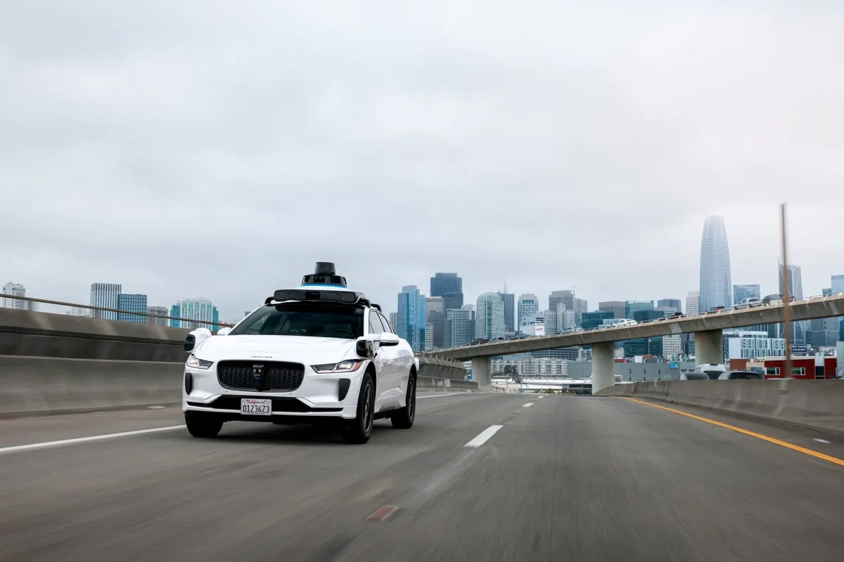 Waymo autonomous vehicle traveling on a highway