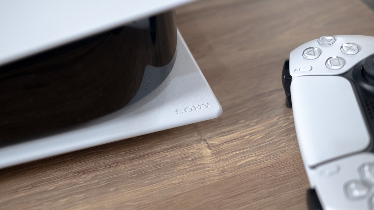 A PlayStation 5 console displayed during a quarterly financial briefing.