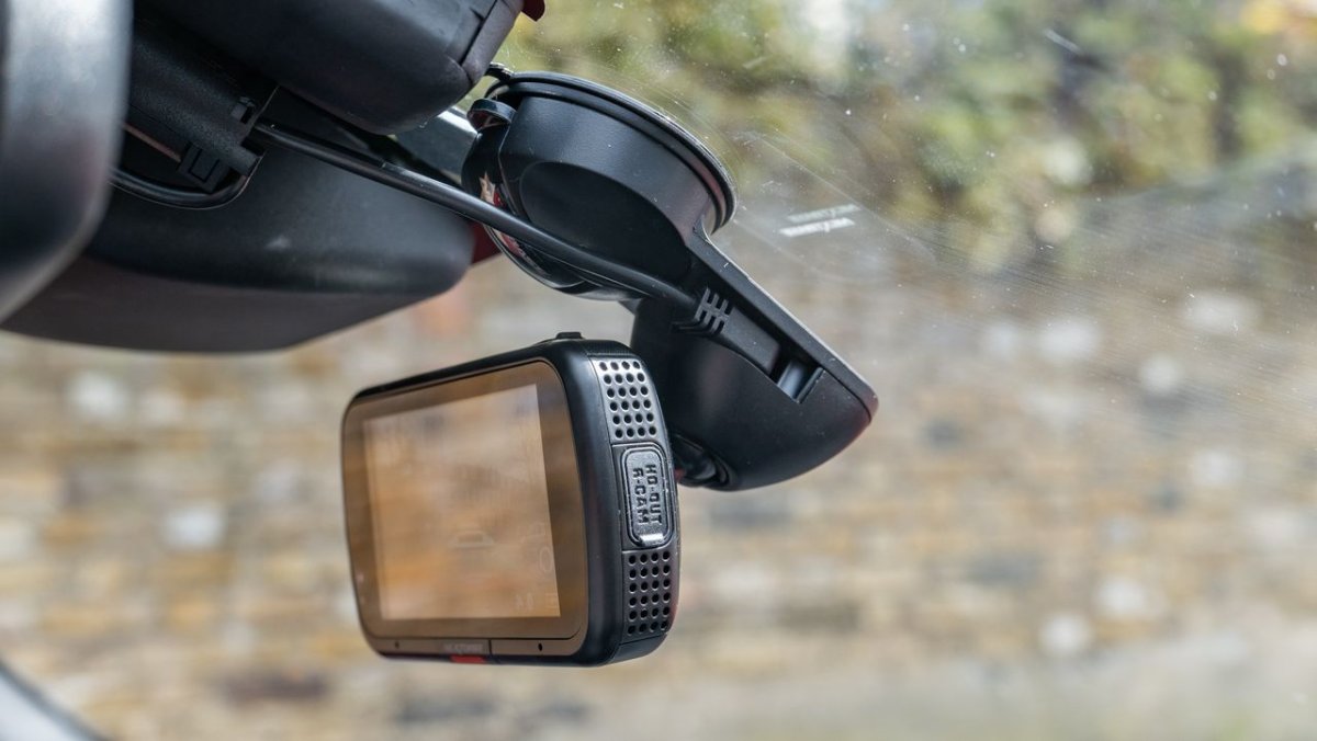 A dashboard camera records road footage for fleet monitoring purposes.