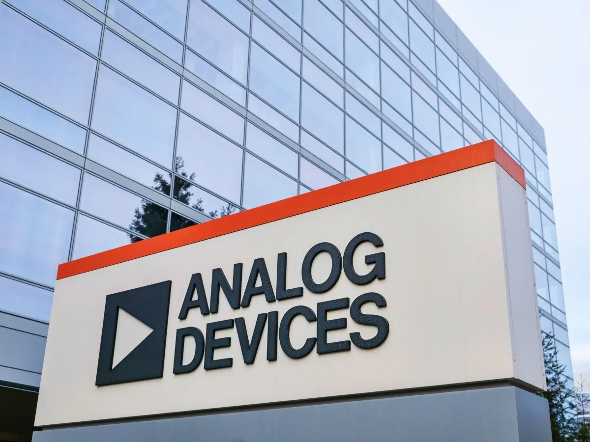 Analog Devices and Empower Semiconductor logos representing the $1.5 billion acquisition deal