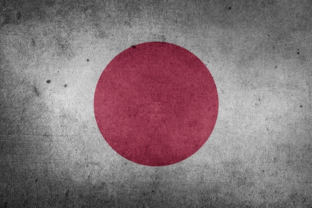 A graph illustrates Japan's population drop to 123 million in 2025 driven by aging demographics and low birth rates.