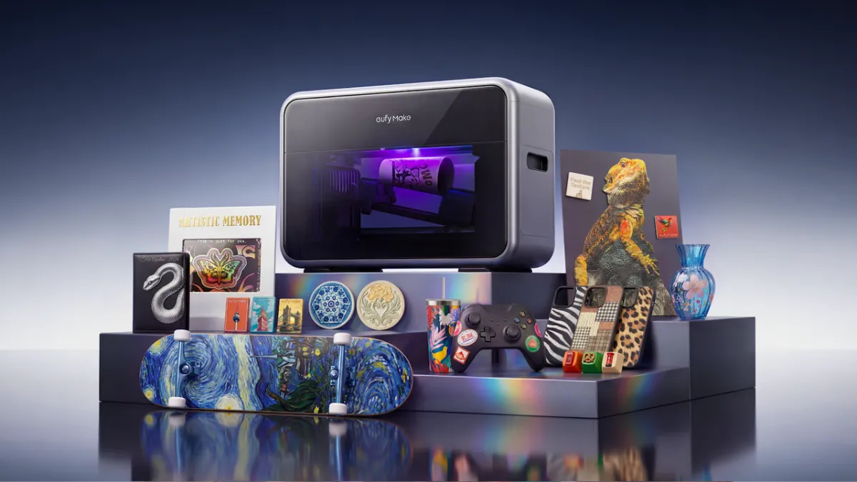 eufyMake E1 UV printer with basic and deluxe bundle accessories displayed on a work surface