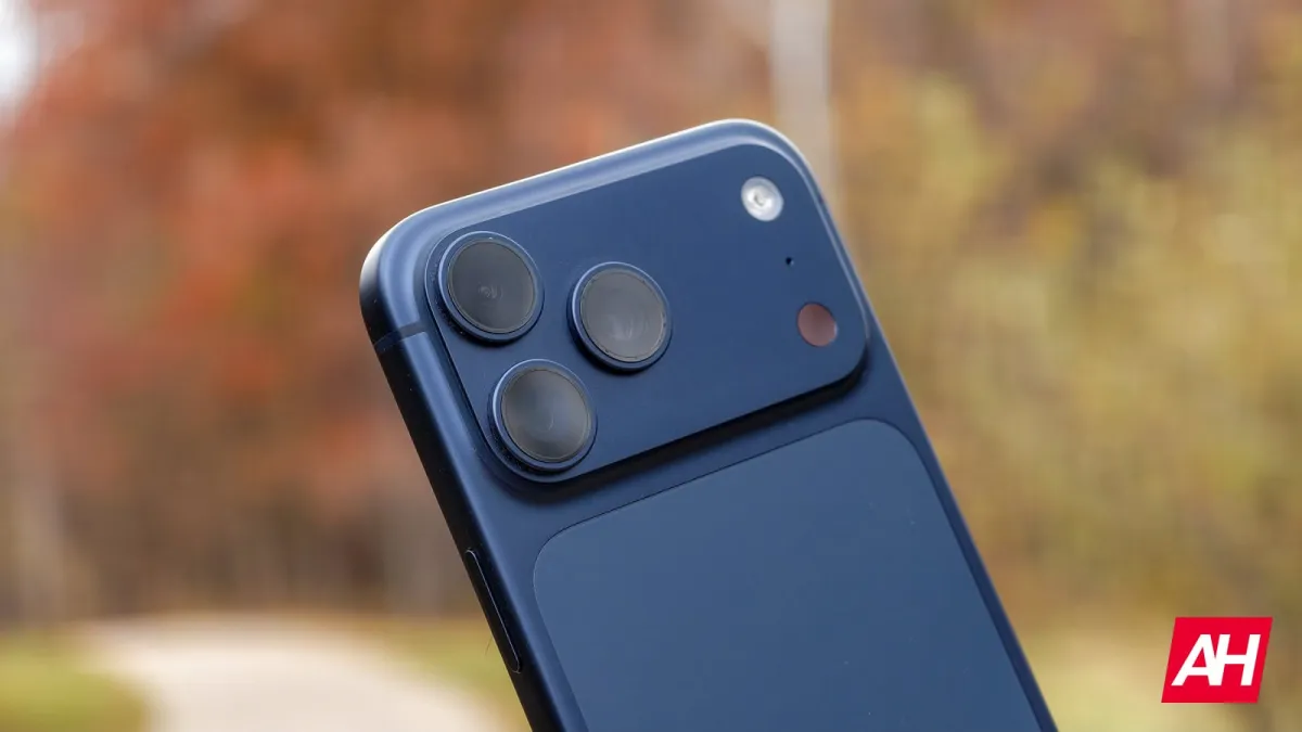 A broadcast technician operates an iPhone 17 Pro to capture live Major League Soccer footage.