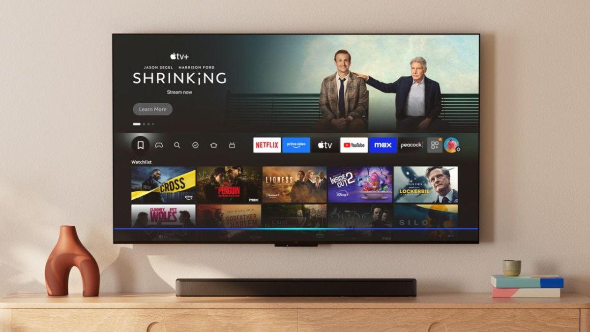 A full-screen pop-up advertisement interrupts the Amazon Fire TV startup sequence.