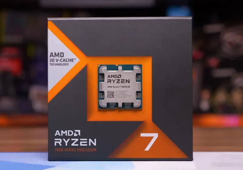 AMD Ryzen 7 7700X3D processor packaging is shown.