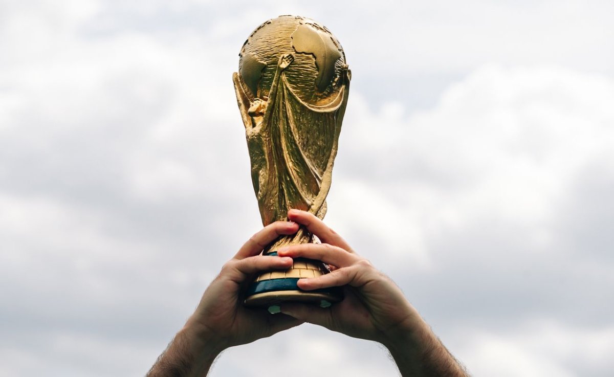 Warning graphic about fraudulent FIFA websites designed to harvest credentials before the 2026 World Cup