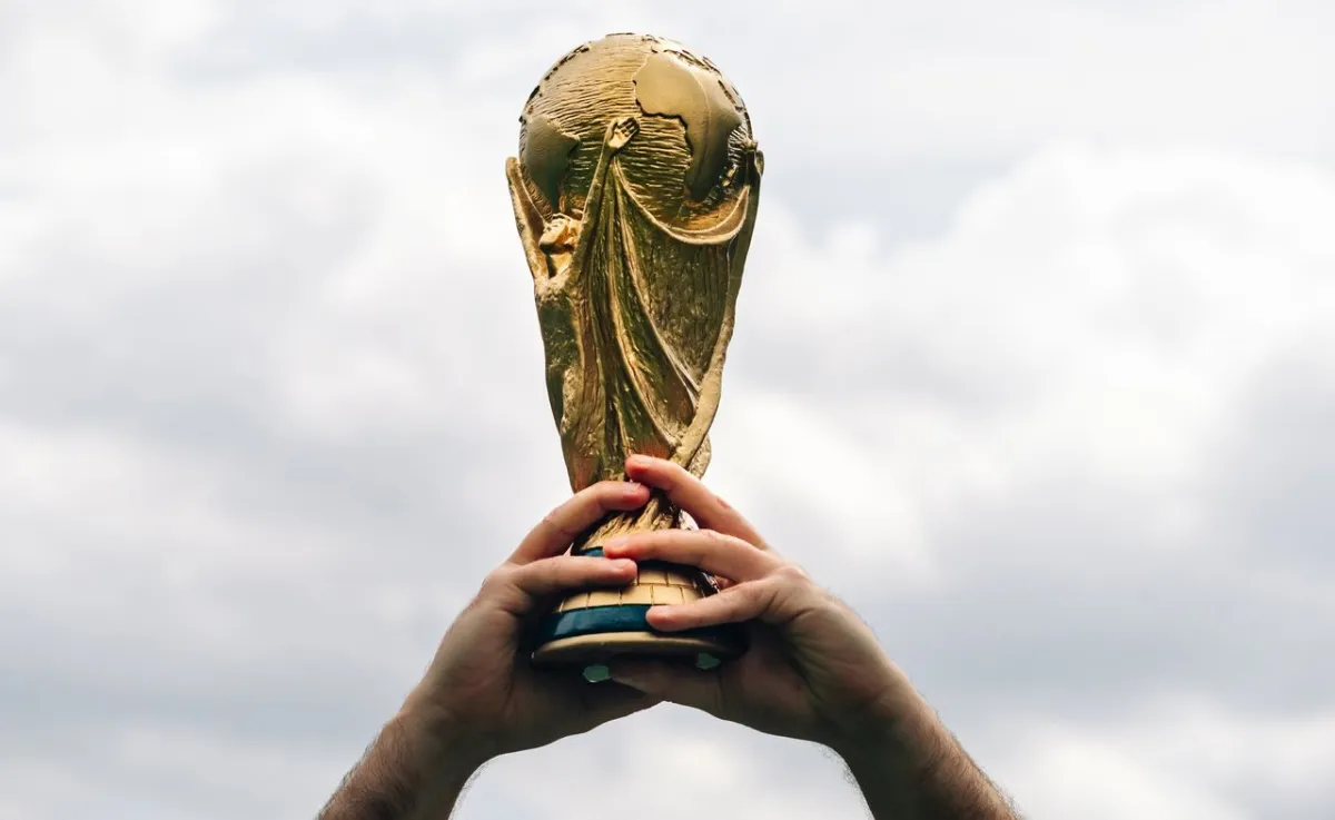 Warning graphic about fraudulent FIFA websites designed to harvest credentials before the 2026 World Cup