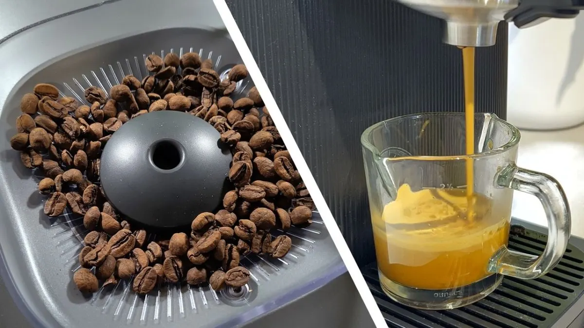 Fresh coffee beans rest beside a modern automatic espresso machine.