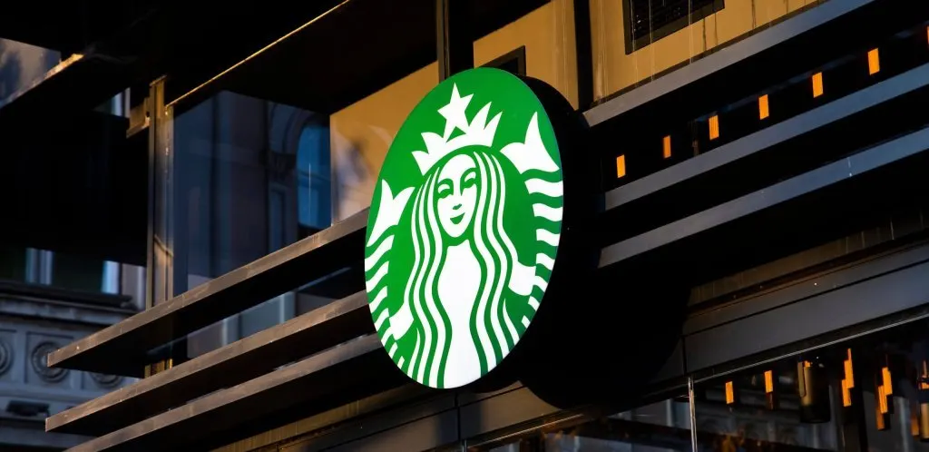 The image displays a Starbucks retail location in China representing the regional business.