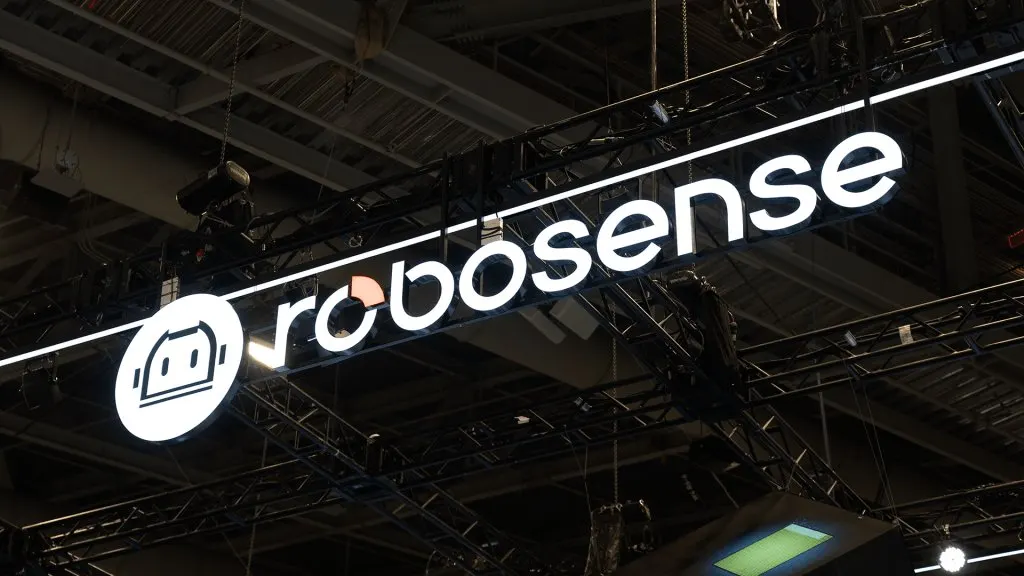 RoboSense displays corporate branding and robotics technology alongside quarterly financial growth.