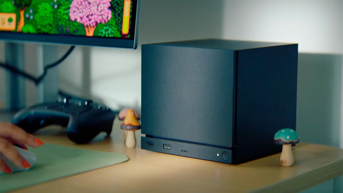 The AMD Steam Machine hardware displays Vulkan certification documentation alongside internal components.