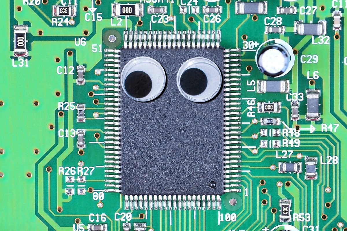 A person records household chores with a smartphone to supply training data for domestic robotics models.