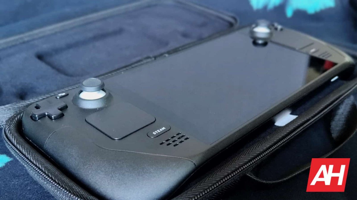 A Steam Deck handheld gaming console rests on a flat surface.
