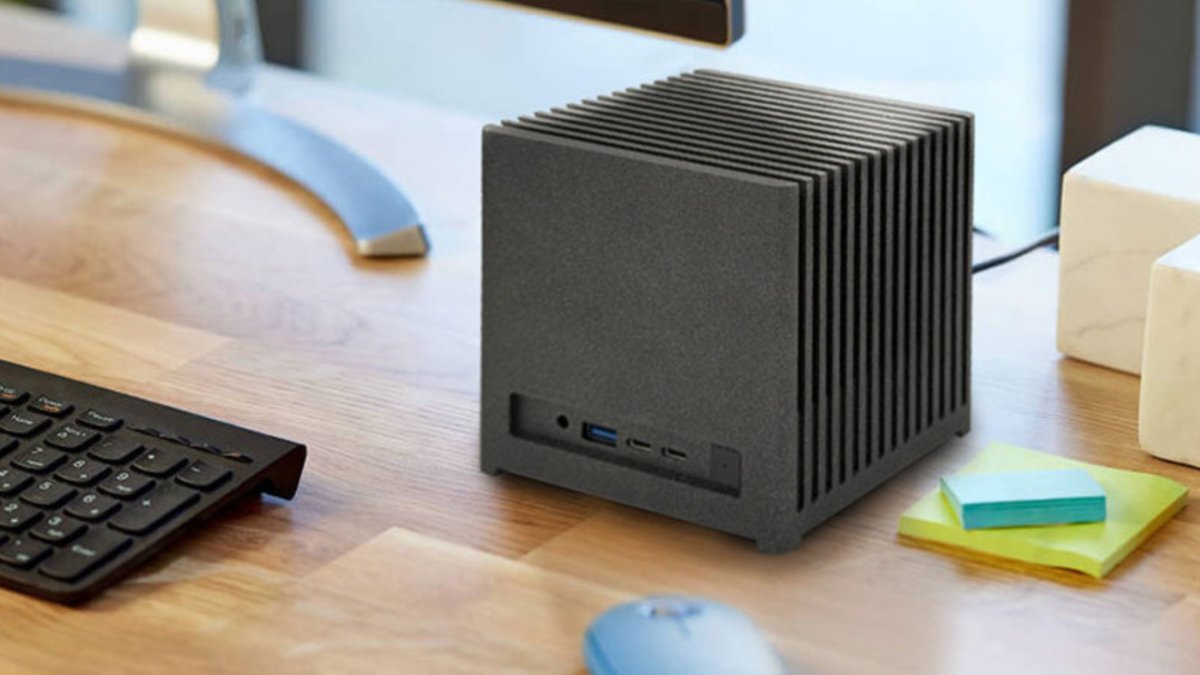 Bleu Jour Kubb Fanless mini PC featuring a sculpted aluminum chassis and vertical heat-dissipating fins.