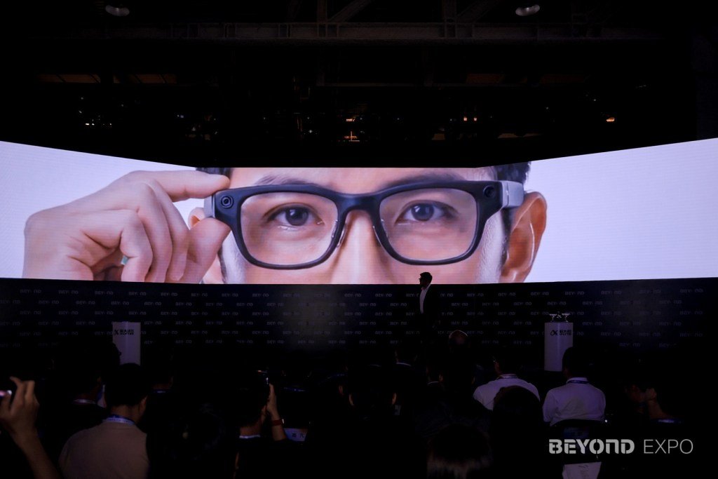 iFlytek displays its 40g AI smart glasses equipped with the GlassClaw agent and advanced noise recognition.