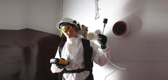 Industrial air quality monitoring sensors installed in a manufacturing facility