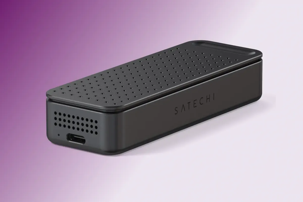 The device features a compact aluminum chassis, an integrated cooling fan, and a Thunderbolt 5 cable.