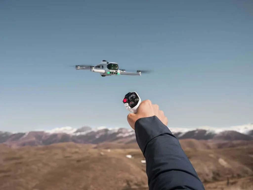 The Antigravity A1 drone features a dual-lens camera and headset controller.