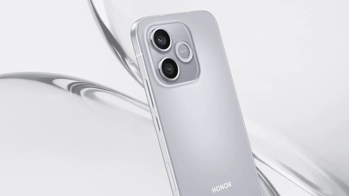 The Honor 600e smartphone is shown from the front with its screen and camera module visible.