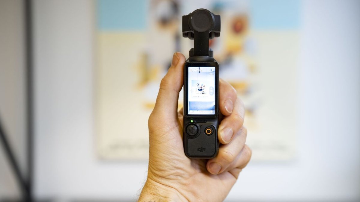 DJI Osmo Pocket 3 compact camera featuring a one-inch sensor and mechanical gimbal for stabilization.