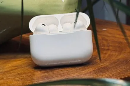 Apple AirPods Pro 3 earbuds and charging case shown on a neutral background.