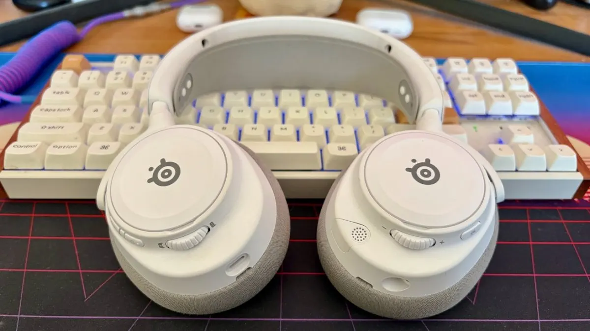 SteelSeries Arctis Nova 7X Gen 2 wireless headset shown with its USB-C dongle