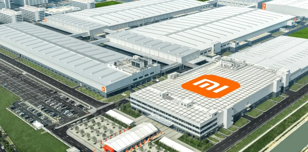 The Xiaomi MIX Flip clamshell foldable smartphone prototype is shown during a development pause.