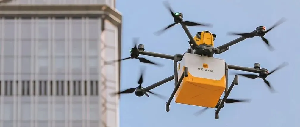Food delivery riders navigate urban streets in China during intense platform subsidy competition.