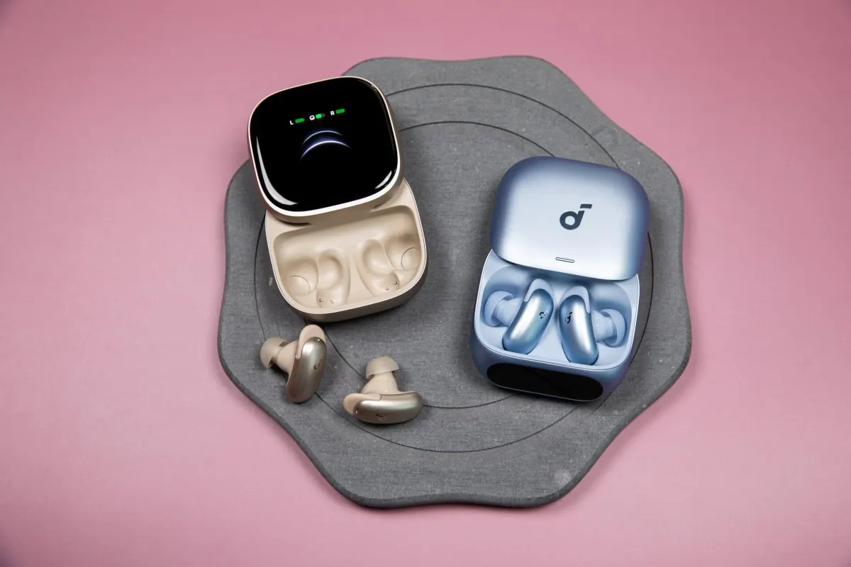 Soundcore Liberty 5 Pro earbuds and charging case displayed on a clean surface.