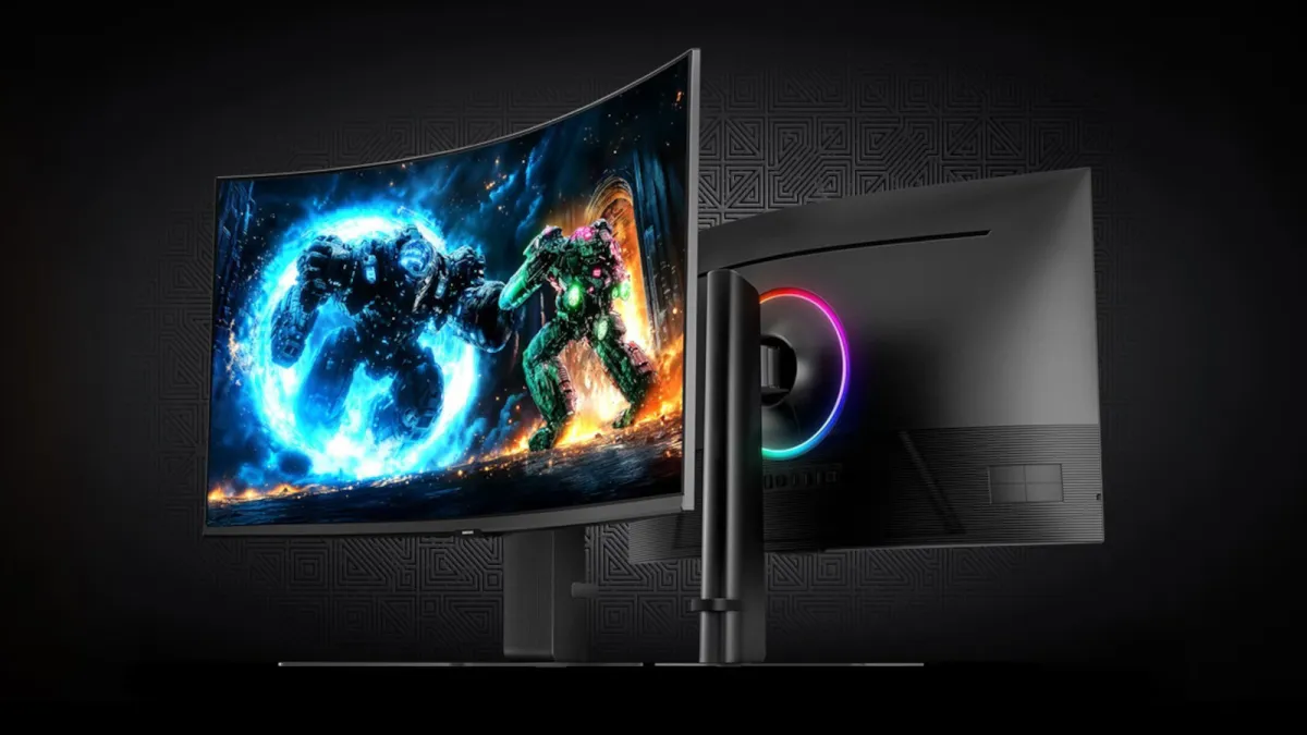 The Samsung Odyssey G75F 40-inch ultrawide monitor sits on a desk with a slim dark frame.