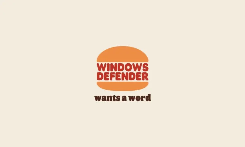 A Windows Defender Firewall alert appears on a Burger King digital order screen in Sheffield.