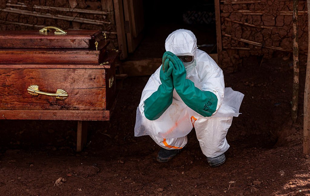 Researchers analyzing disease surveillance data during an Ebola outbreak in Central Africa