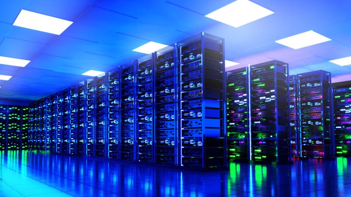 Ultra-dense fiber optic cables connect network switches inside a modern hyperscale data center.