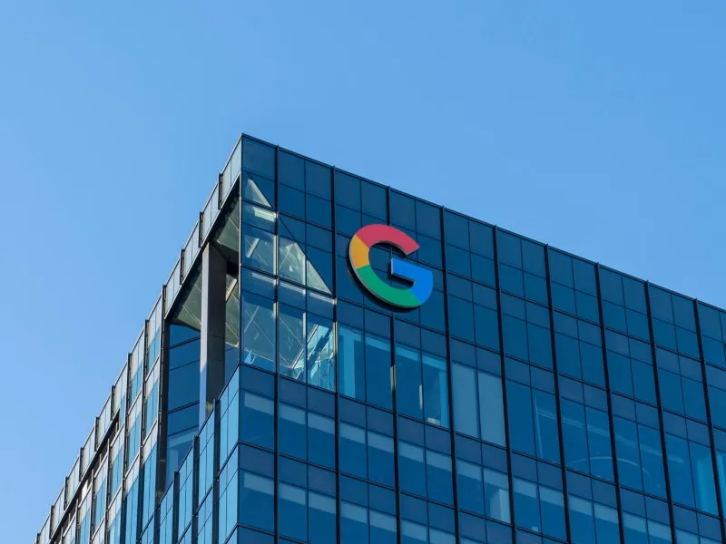 Google search interface alongside European Union regulatory documents regarding antitrust fine