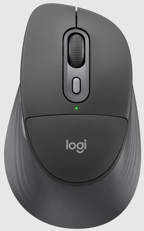 Logitech Signature Comfort Plus ergonomic peripherals are arranged on a clean desk surface.
