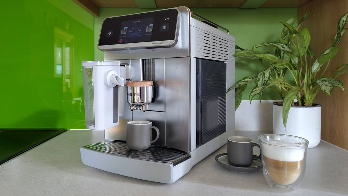 Philips Cafe Aromis 8000 Series automated espresso machine featuring dual milk carafes and app connectivity.