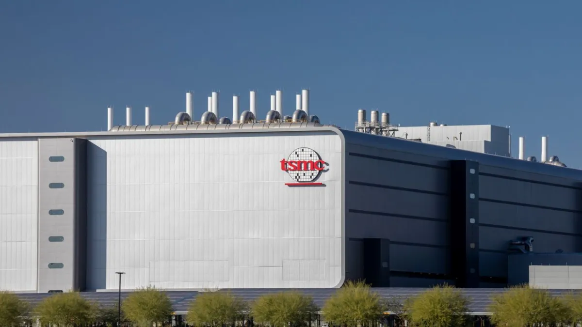 TSMC semiconductor factory exterior illustrating ongoing labor negotiations and bonus disputes