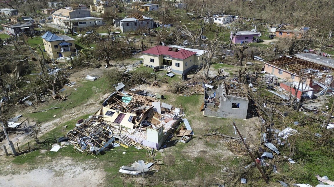 A weather map displays projected Atlantic hurricane tracks and coastal emergency preparedness zones for 2026.