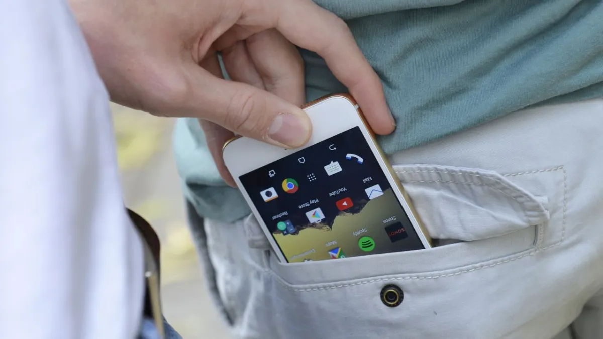 A smartphone displays a security notification to protect user data from theft.