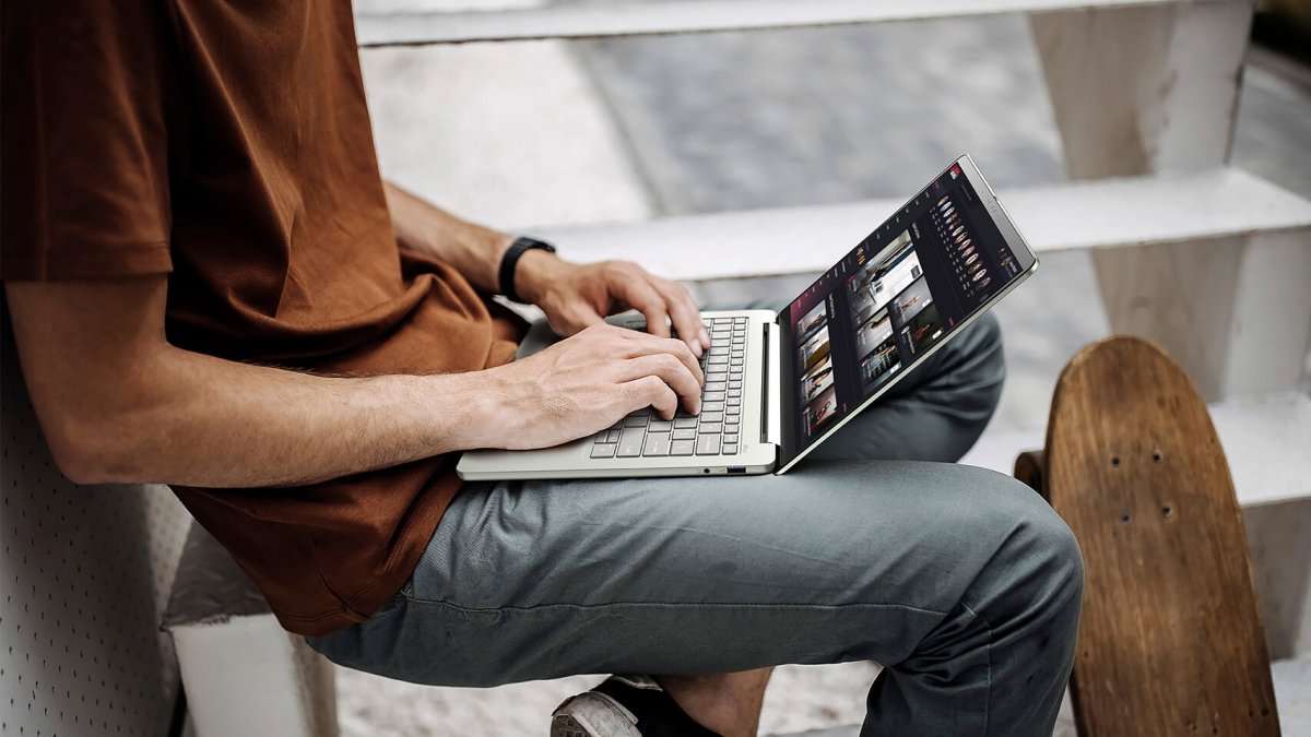 Acer Swift Air 14 and Swift Spin 14 AI laptops displayed side by side.
