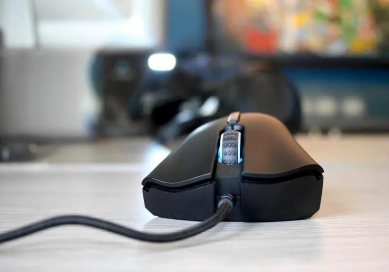 An early computer mouse prototype displaying its button configuration.
