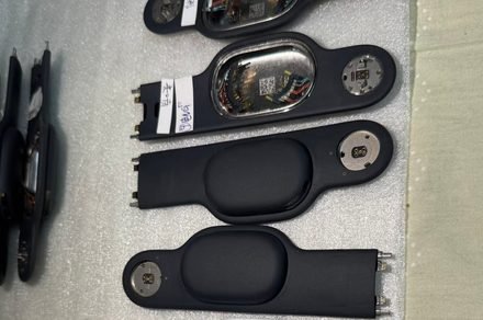 Dark-finished prototype components of Apple's Vision Pro headset reveal ongoing exterior design exploration.