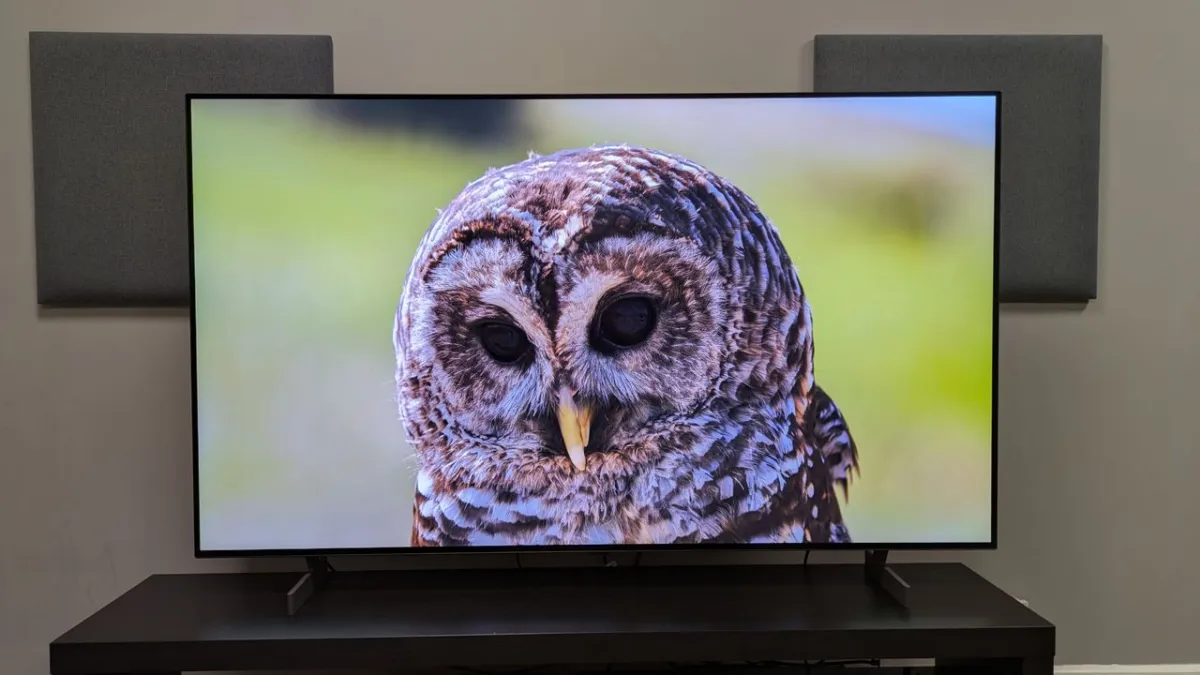 The LG B6 OLED television is shown from the front with a bright gaming display.